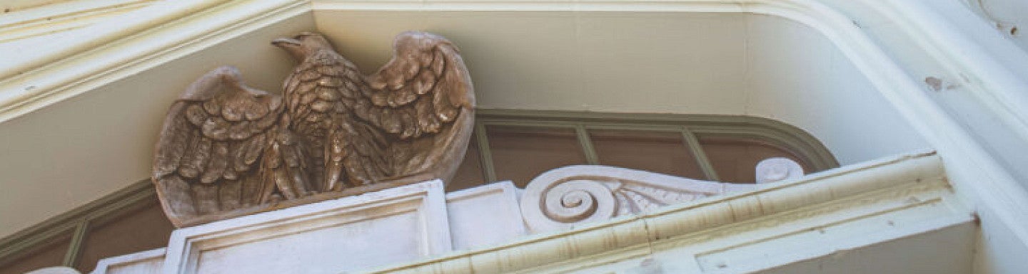 A photo taken at the bottom entrance of Hotel North Bend looking up the front of the building.