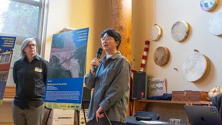 Photograph of Yizhao Yang and Christina Bollo presenting their courses to the SCYP luncheon. 