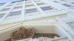 A photo taken at the bottom entrance of Hotel North Bend looking up the front of the building.