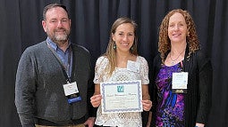 Photo of IPRE's Aniko and student team member Alli at the OAPA Award Ceremony. 